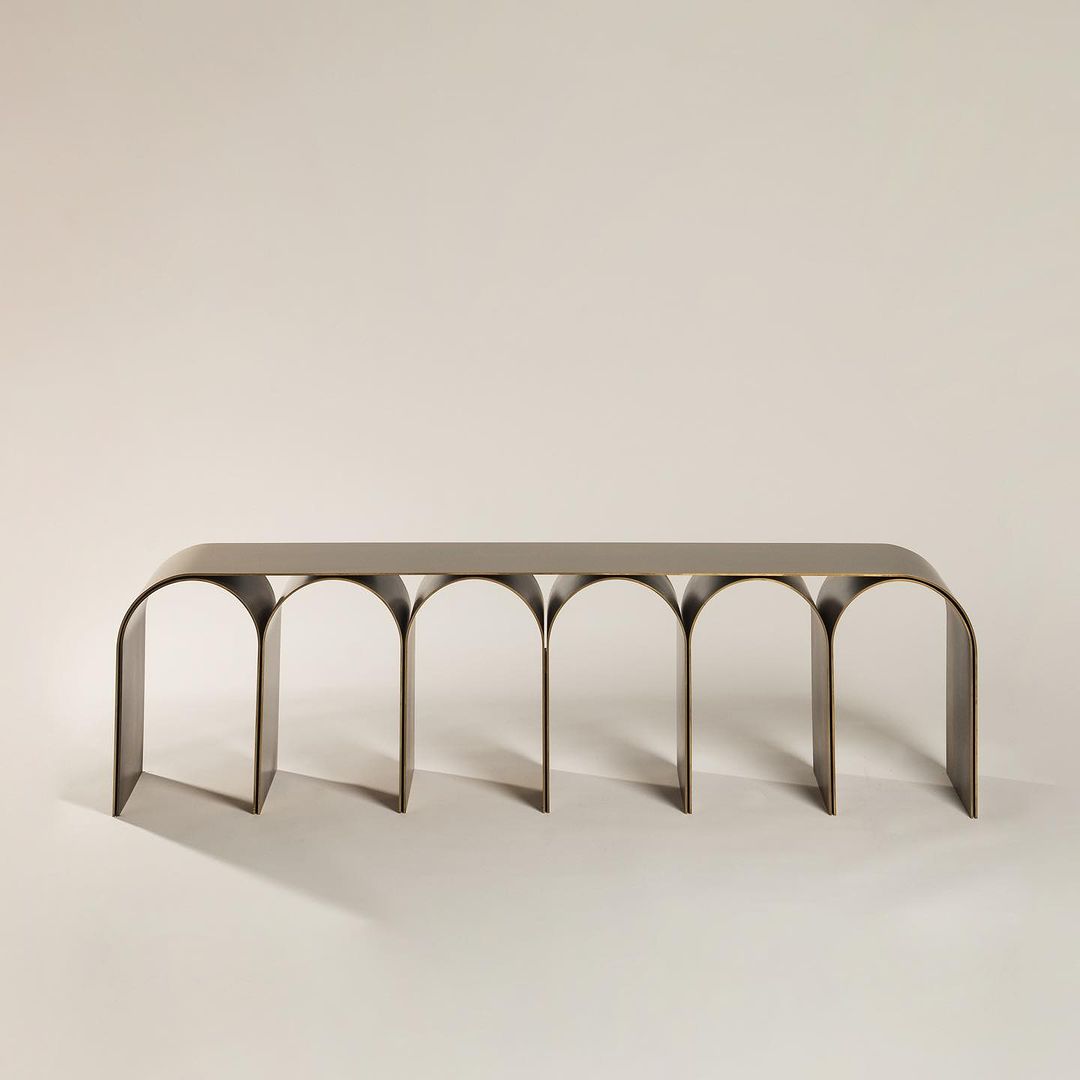 A modern designed metallic arch bench