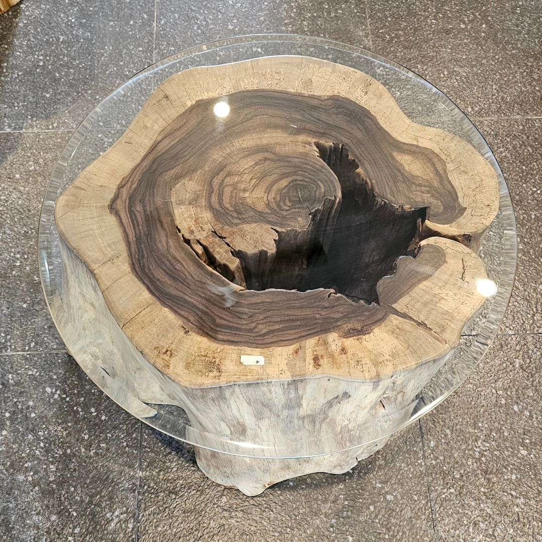 A unique table blending natural wood and modern glass