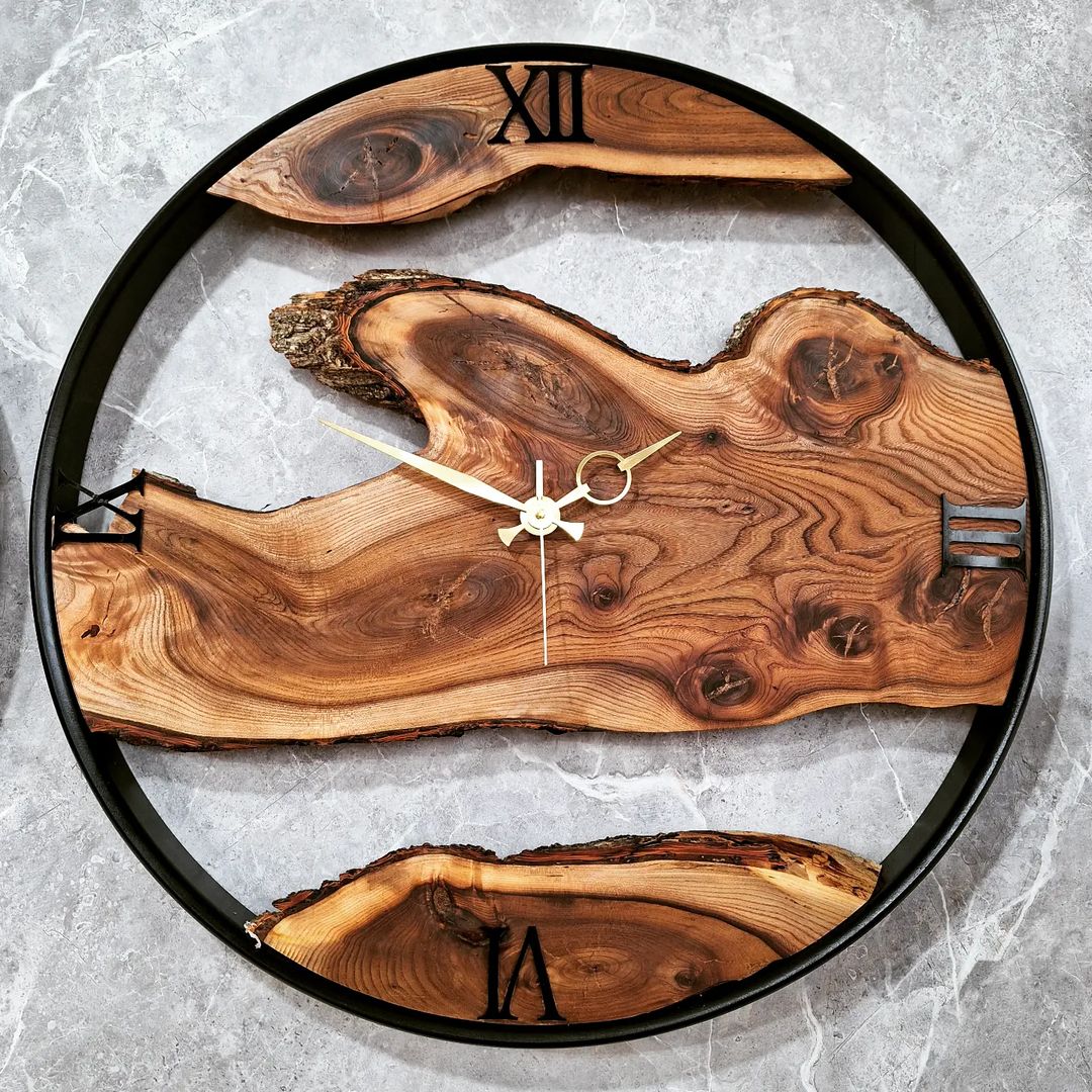 A unique wooden clock crafted from a live-edge slab, encased in a black round frame