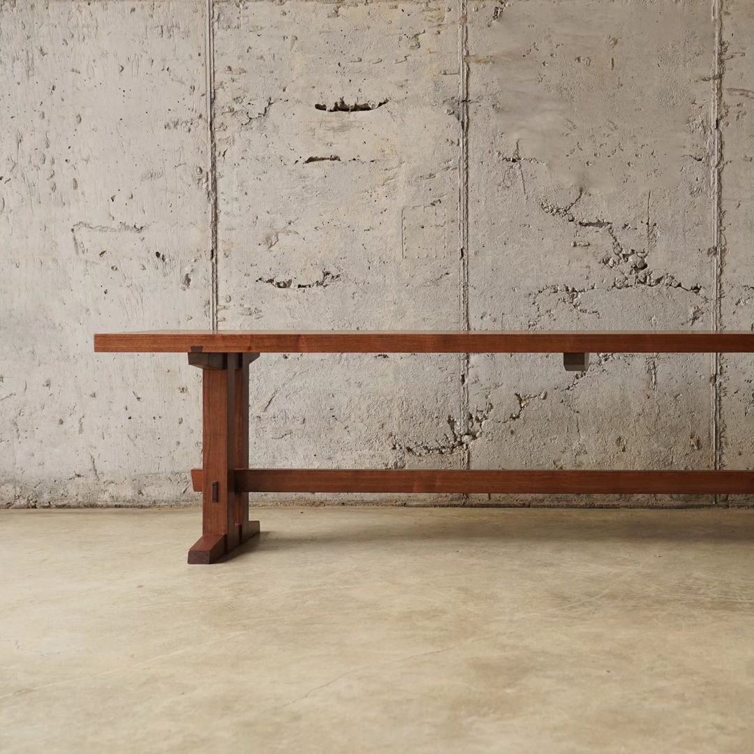 A minimalist and robust wooden bench