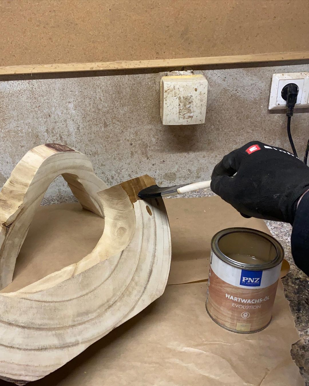 Applying finish to a wooden piece