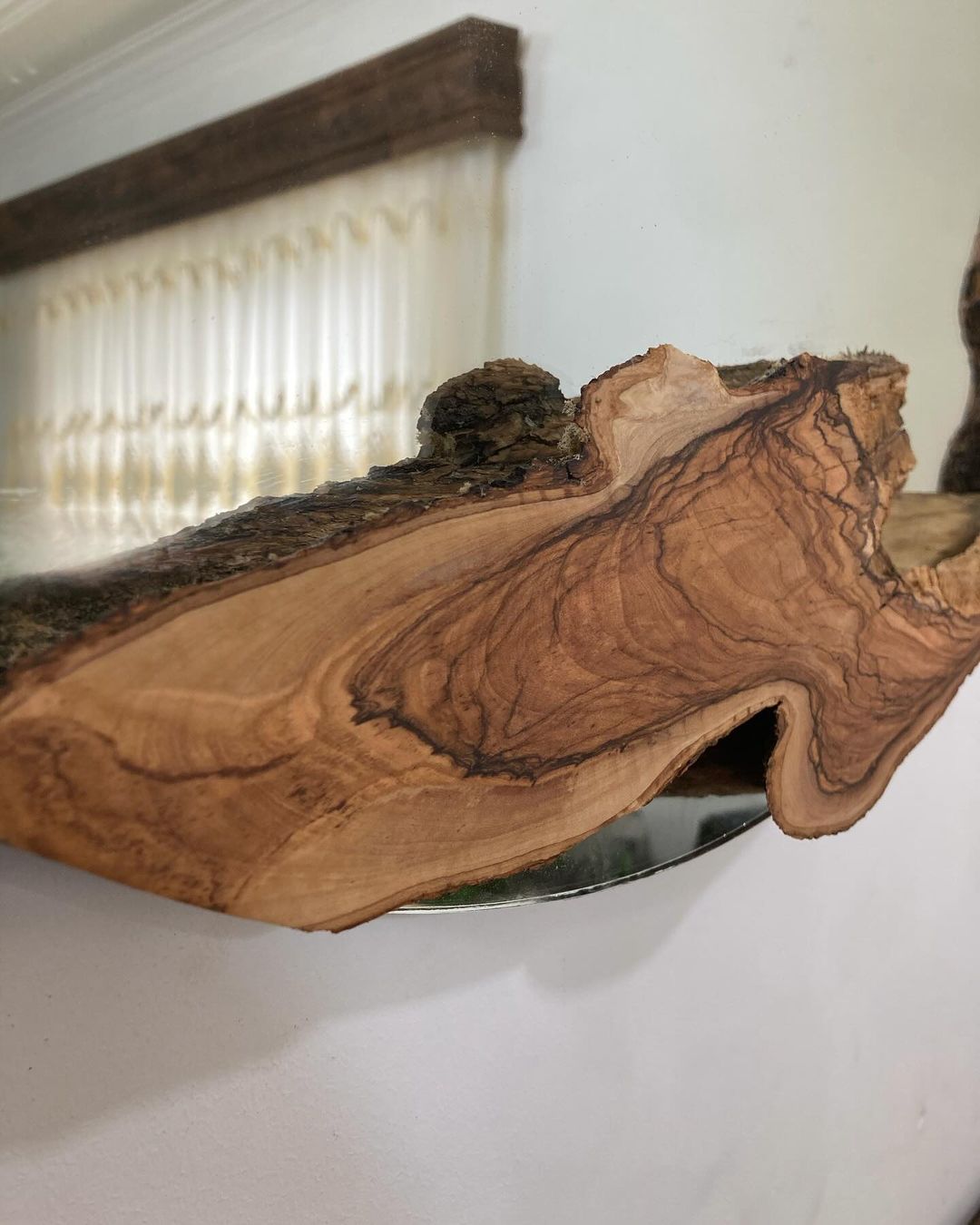 Unique wood piece showcasing natural edges and intricate grain patterns