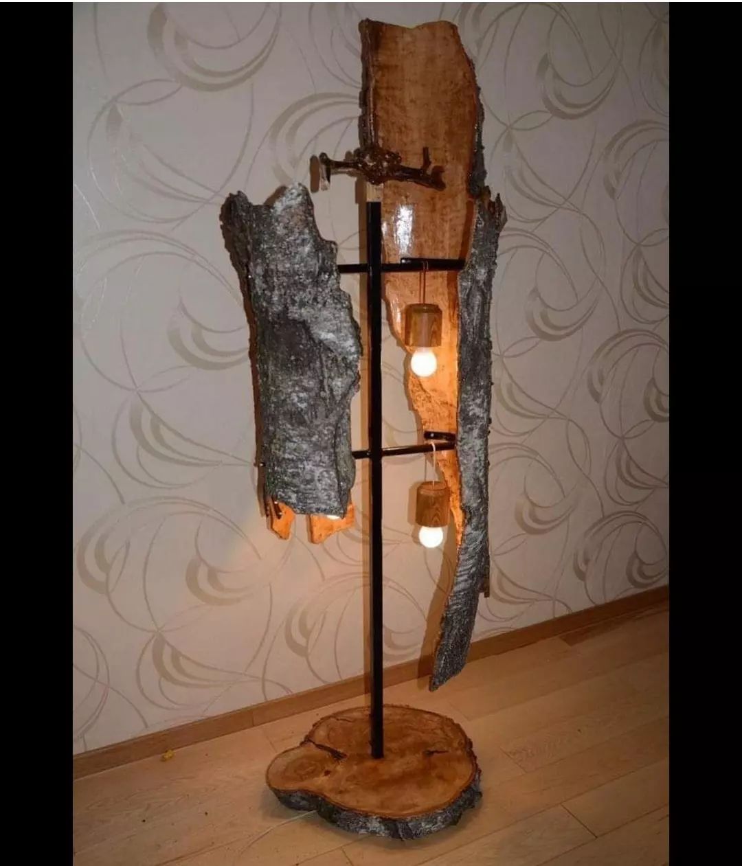 A rustic tree bark floor lamp