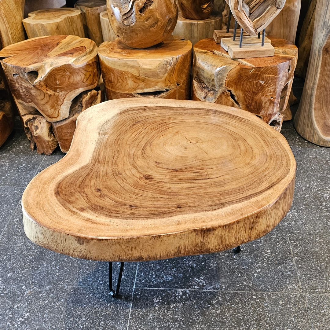 A unique wooden coffee table showcasing natural wood grain patterns