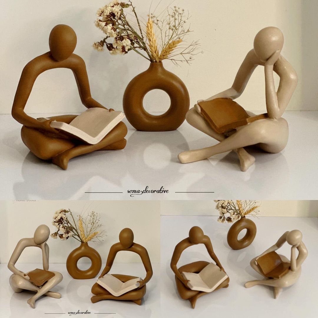 Abstract Artistic Figurines Displaying Different Reading Poses