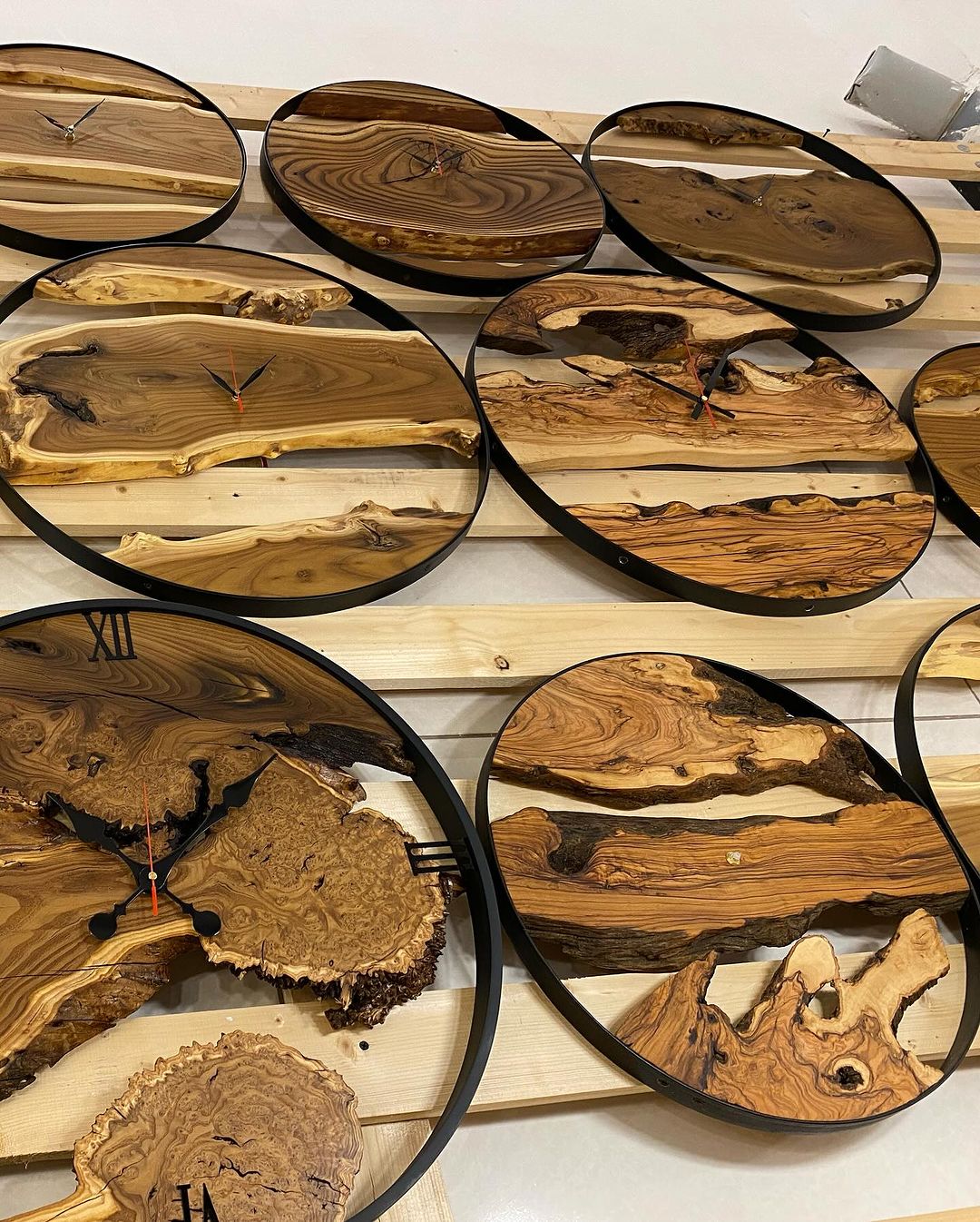 Handcrafted wooden wall clocks with rich natural wood patterns