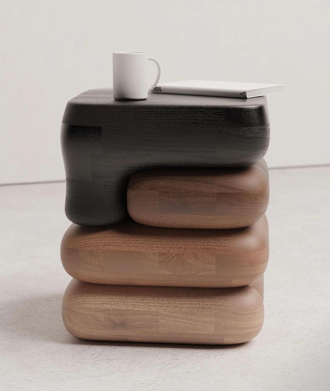 A uniquely sculpted side table combining dark and light wooden tones