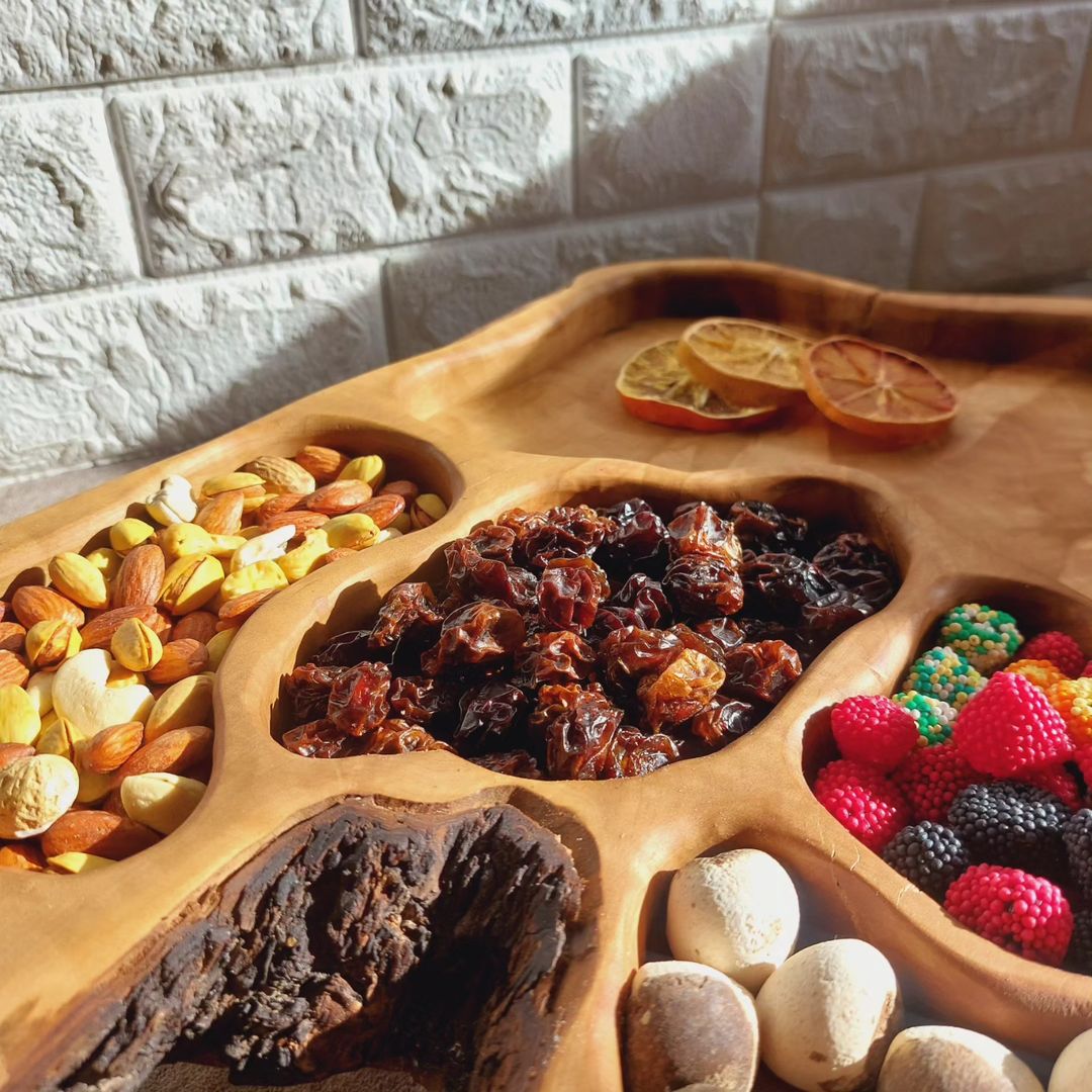 A beautifully assorted snack tray with various treats