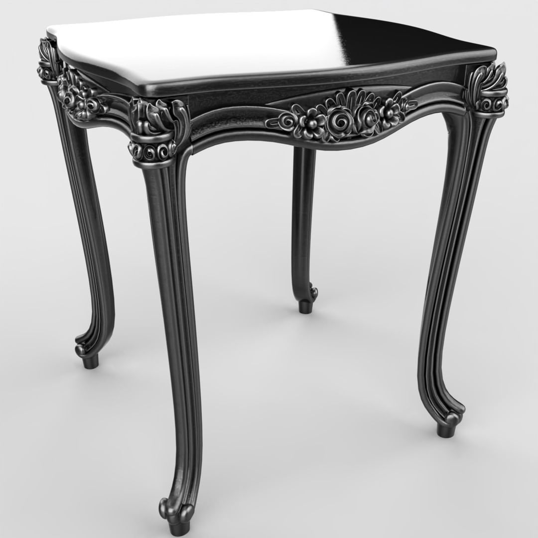 An ornate baroque-style table with intricate detailing and curved legs