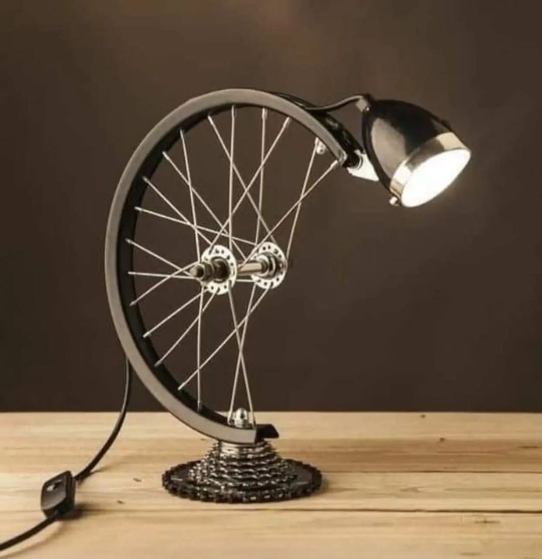 A unique lamp designed to mimic a bicycle wheel