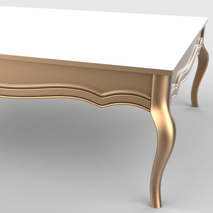 Classic golden and white table with curved legs and ornate details