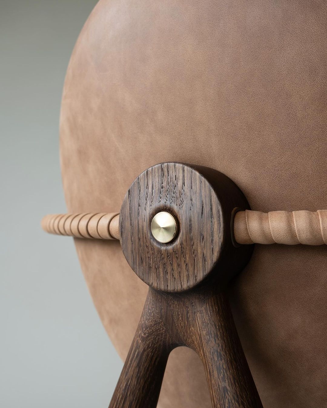 A meticulously crafted wooden chair detail