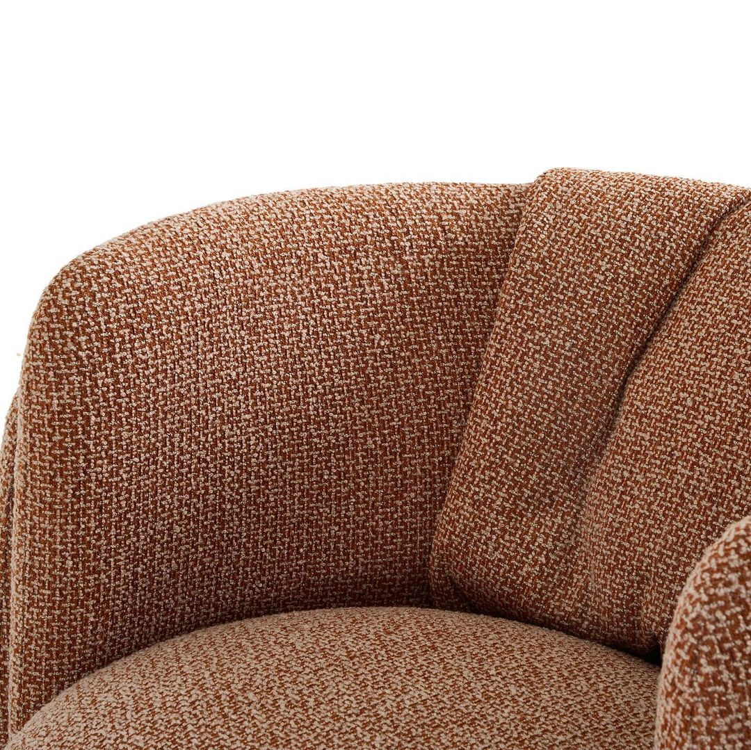 A comfortable armchair with a textured brown fabric