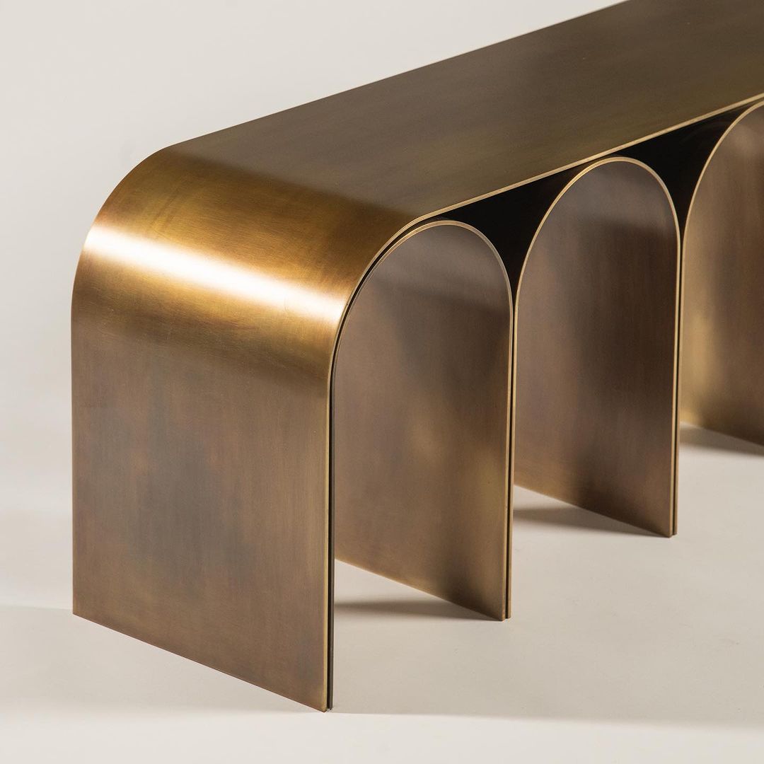 Contemporary brass console table