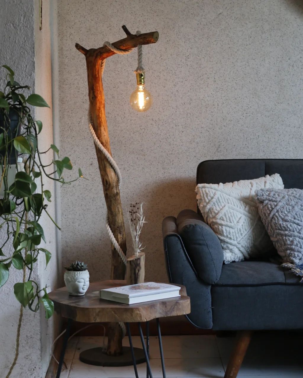 Cozy corner with a unique lamp made of a twisted branch