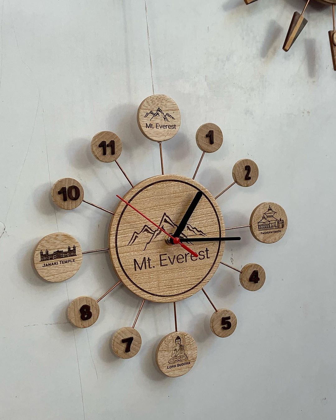 Decorative wall clock with a Mount Everest theme