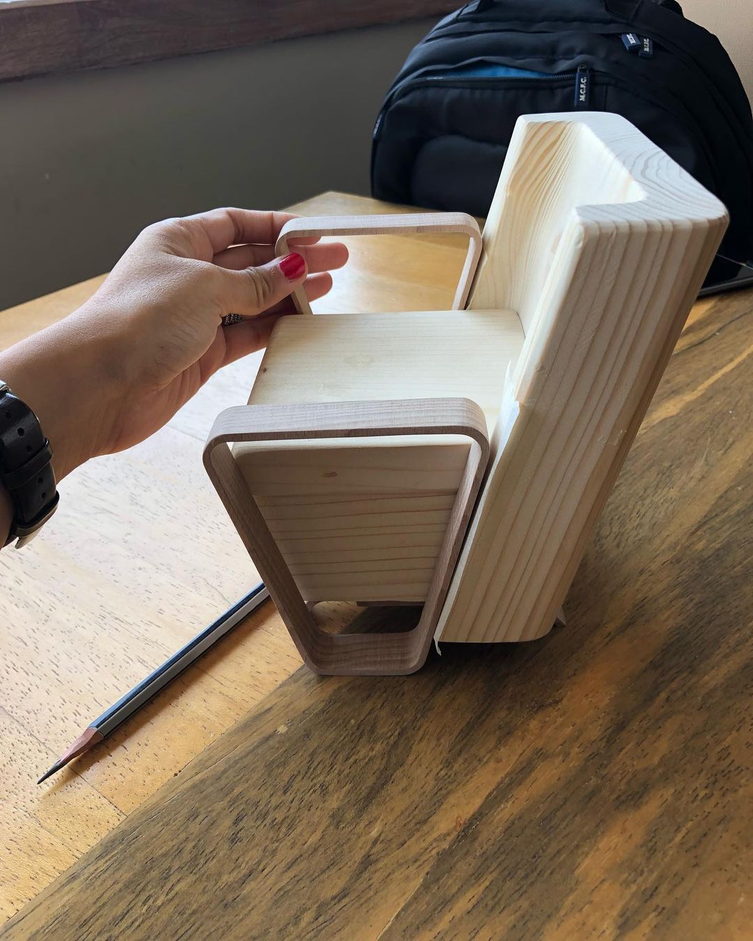 An innovative wooden book design that expands and contracts like an accordion