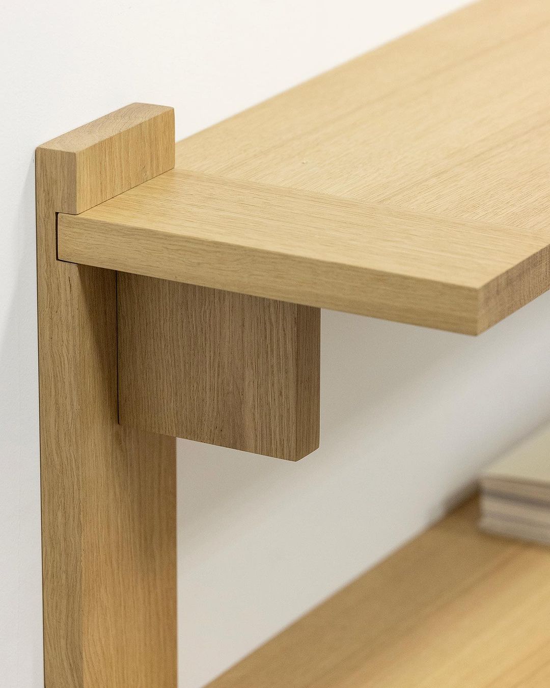 A finely crafted wooden shelf and support