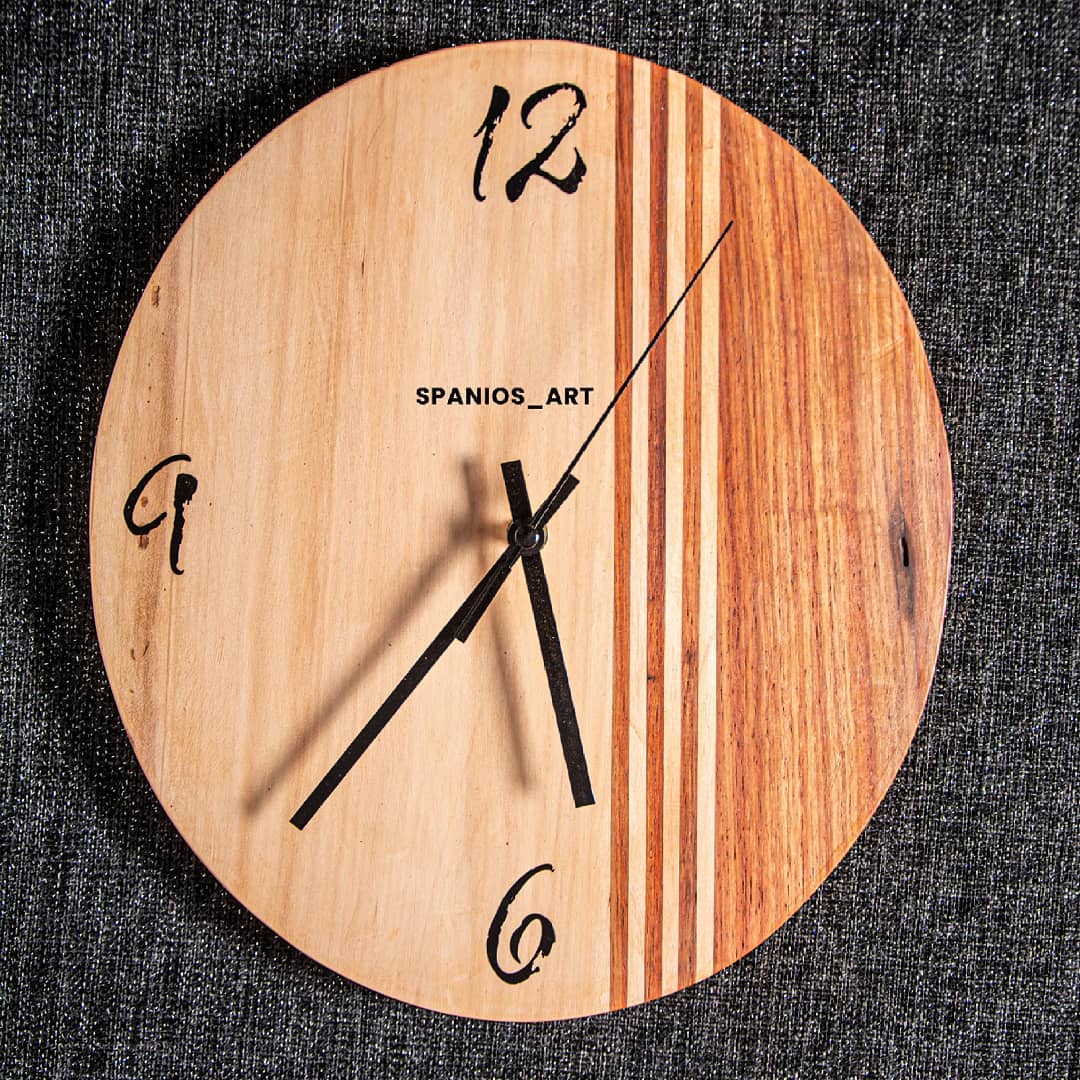 Handcrafted wooden clock with artistic numerals