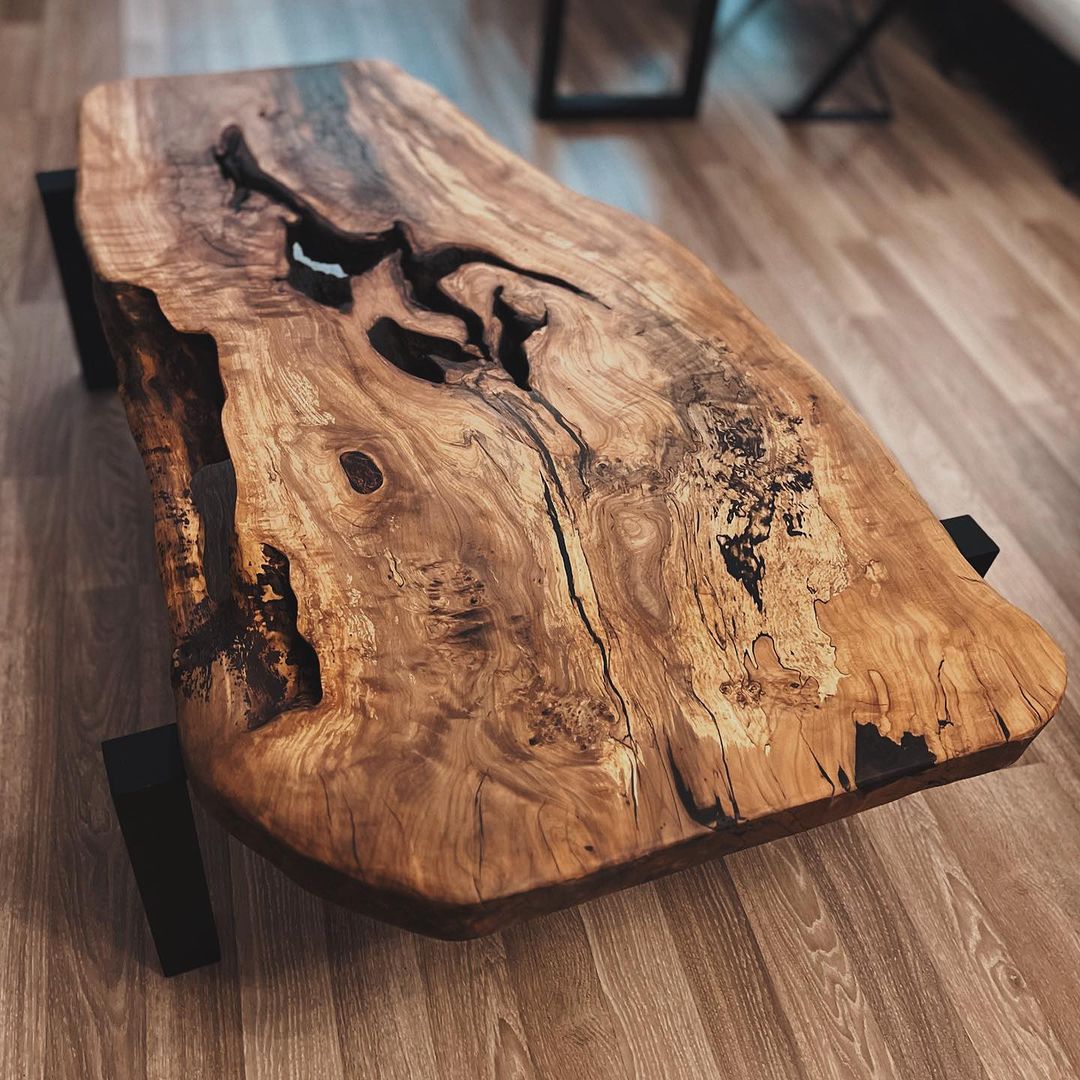 A handcrafted wooden coffee table with intricate grain patterns