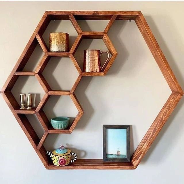 Hexagonal Wooden Shelf with Decorative Items