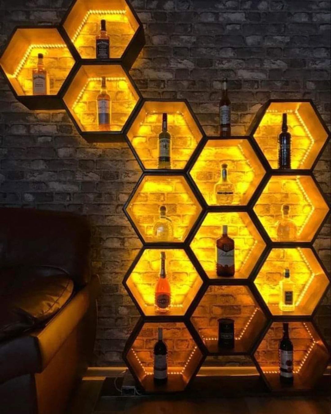 Honeycomb-inspired wall-mounted liquor shelf with backlighting