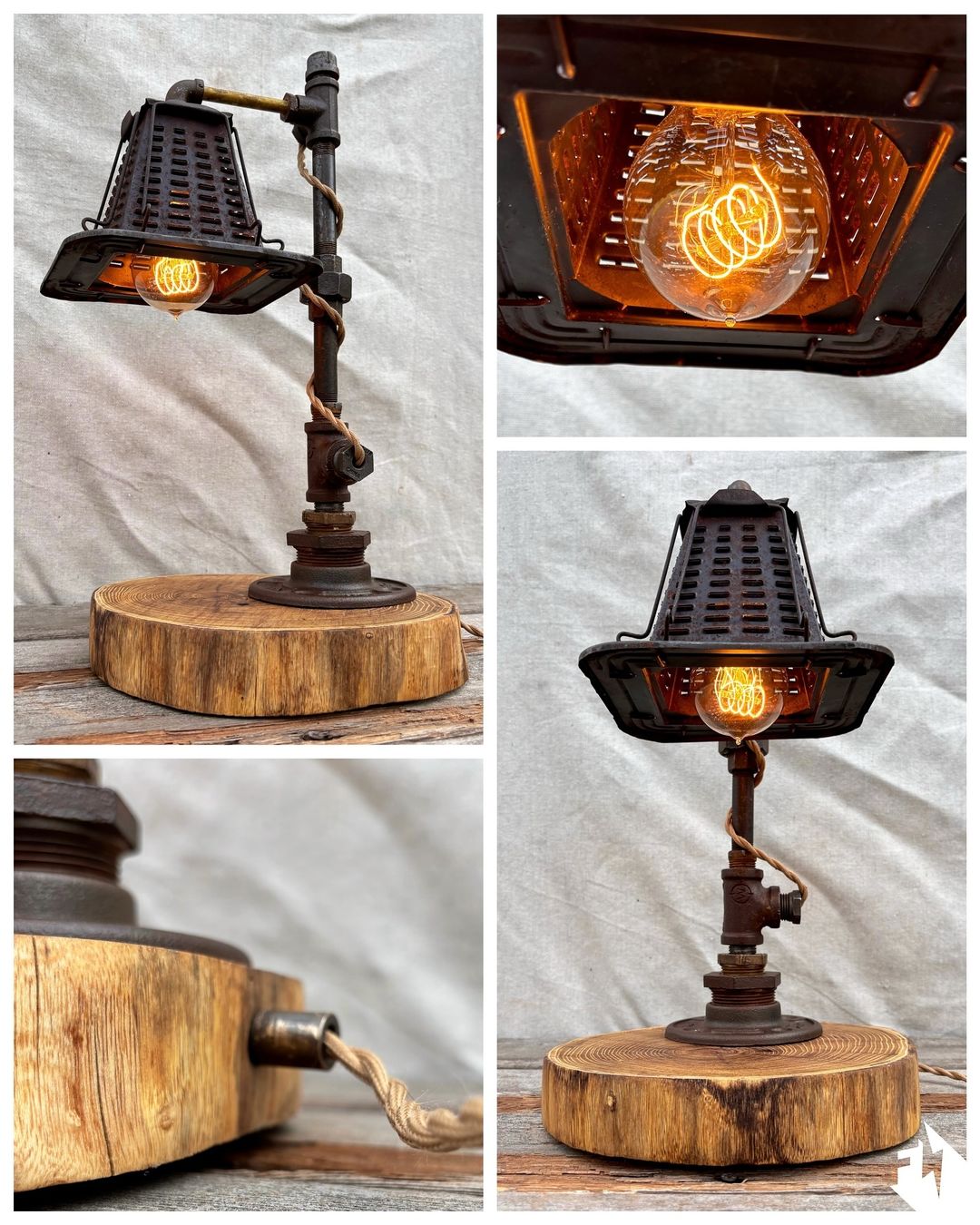 A unique and industrial-style table lamp constructed from repurposed metal piping and fixtures, mounted on a rustic wooden base.