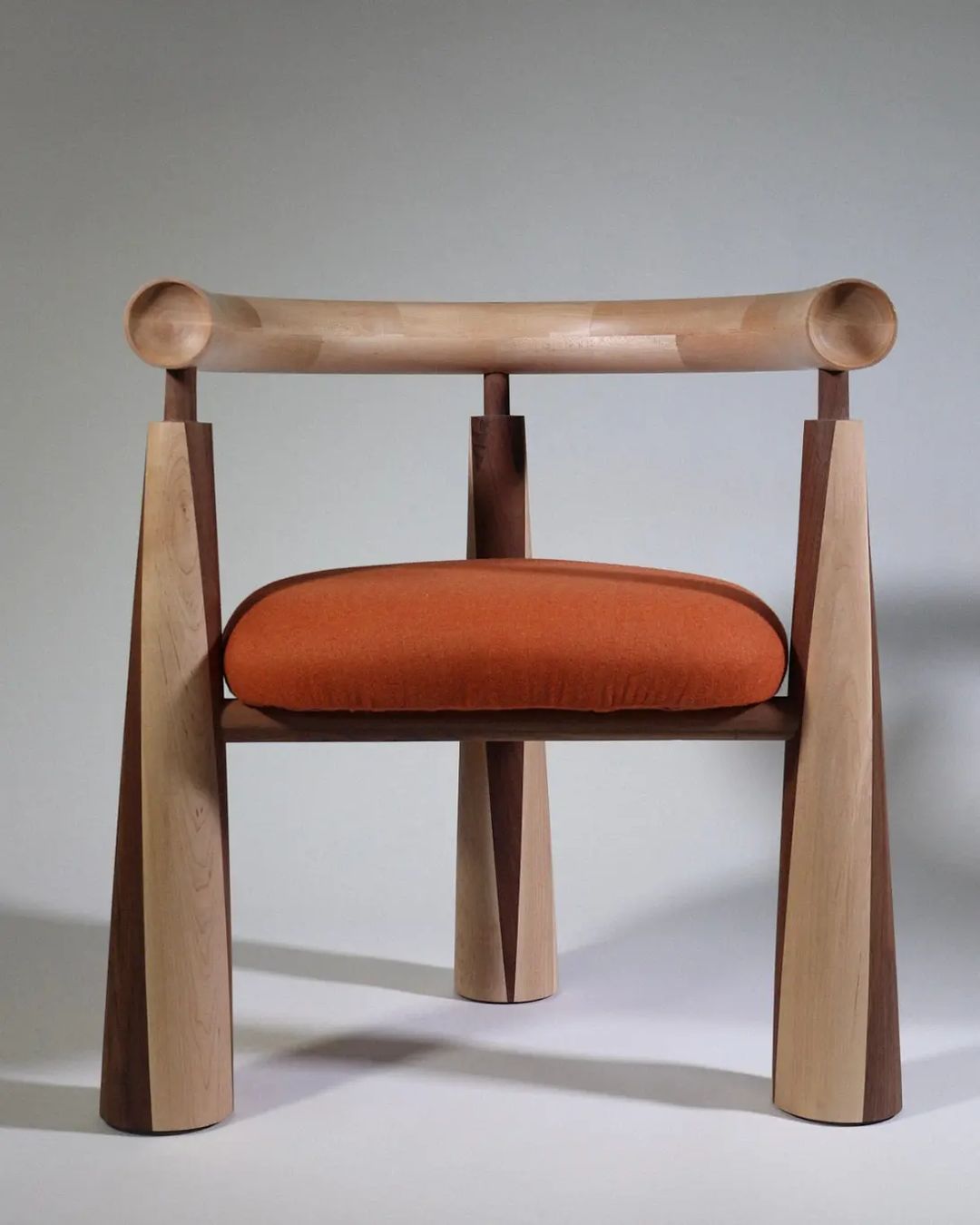 Unique Wooden Chair with Curved Armrest