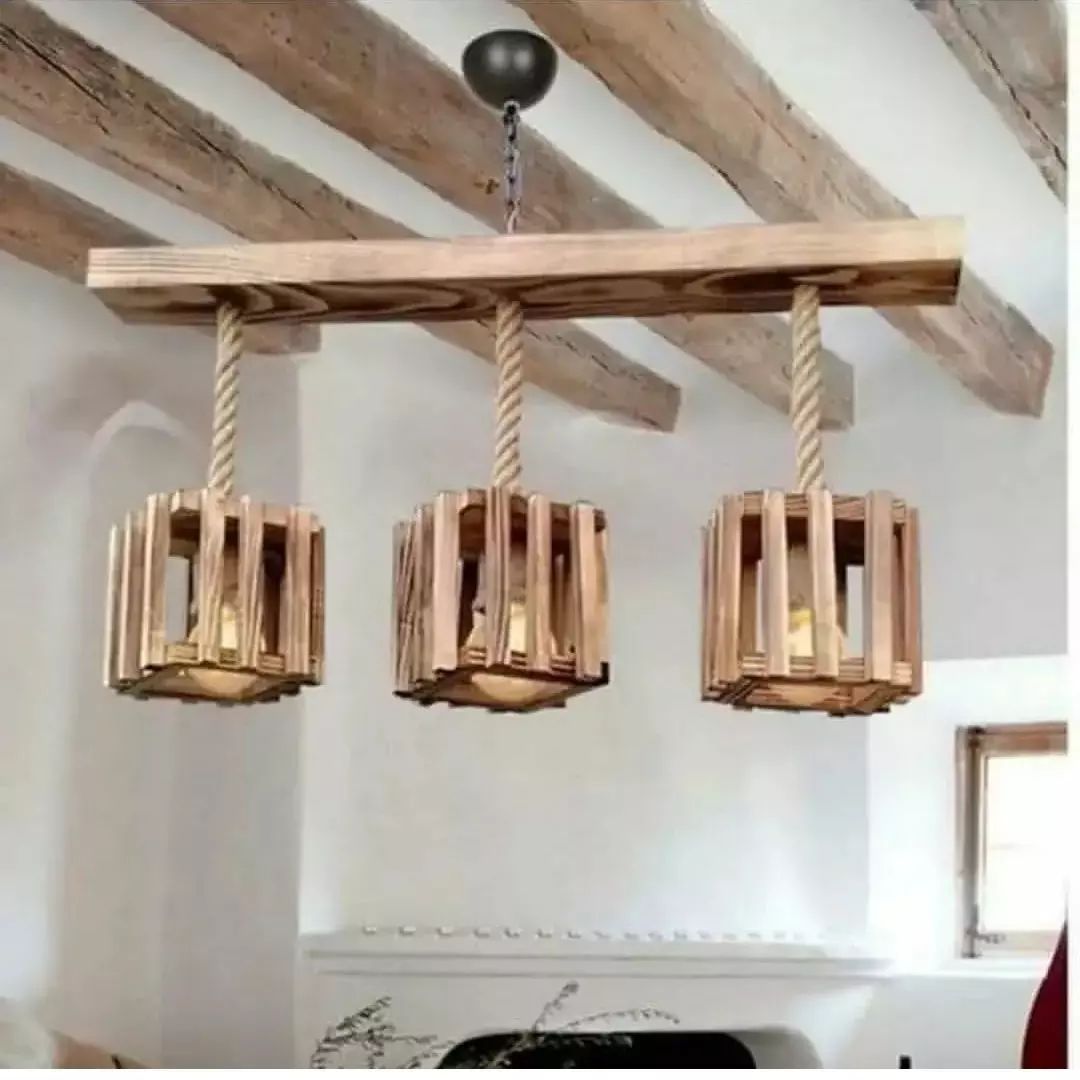 A unique wooden chandelier design with robust ropes suspending square frames.