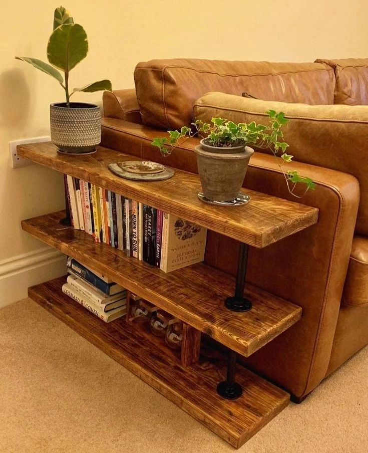 A cozy reading nook with a wooden bookshelf integrated into a leather couch