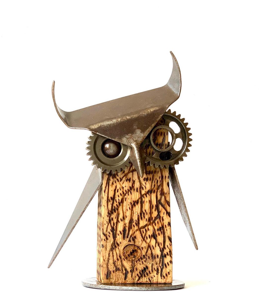 A creative sculpture with mechanical elements resembling an owl