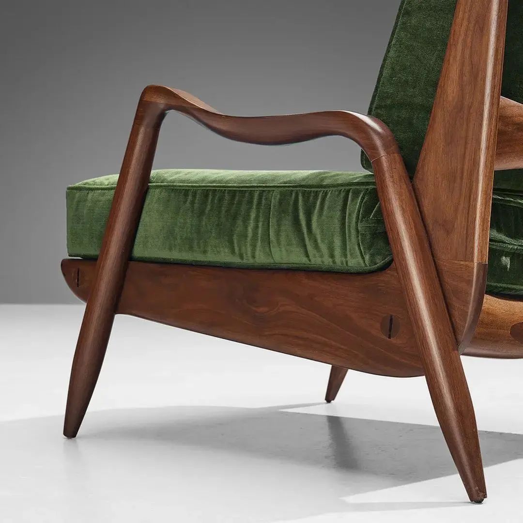 Mid-century modern chair with green velvet