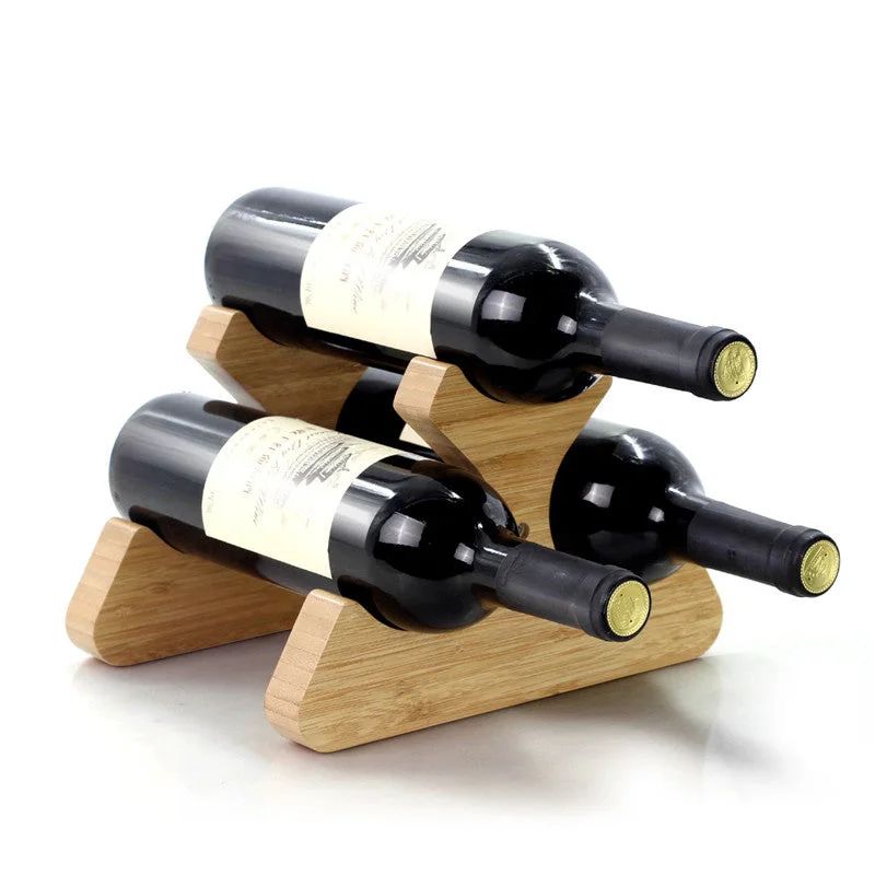 A minimalist wooden wine rack holding three bottles