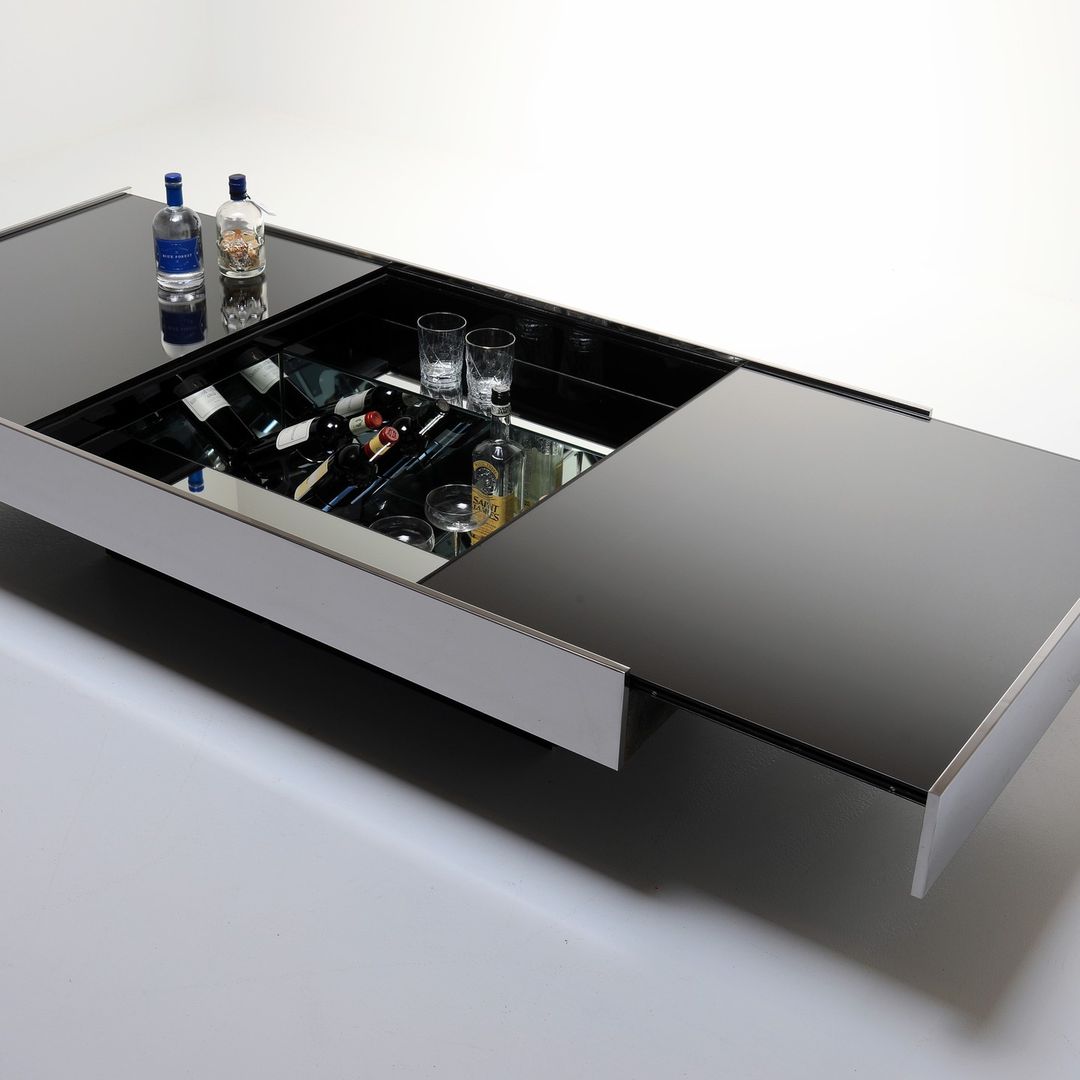 A versatile coffee table with an integrated storage compartment and sleek reflective surface