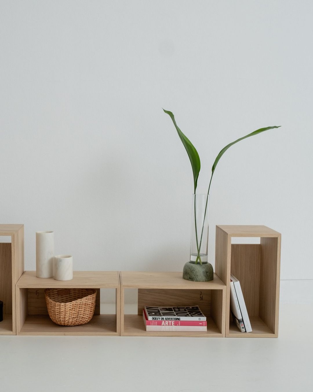 A minimalistic shelf with carefully placed decor