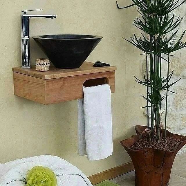 Contemporary basin and tap with adjacent plant