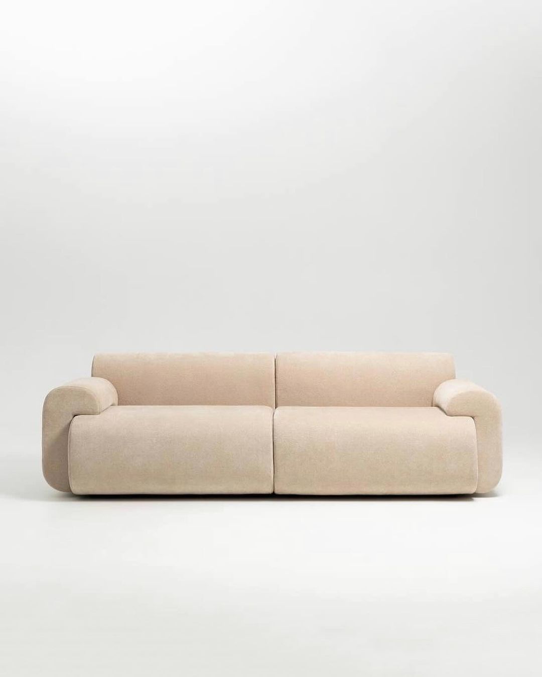 Minimalist beige sofa with a contemporary design