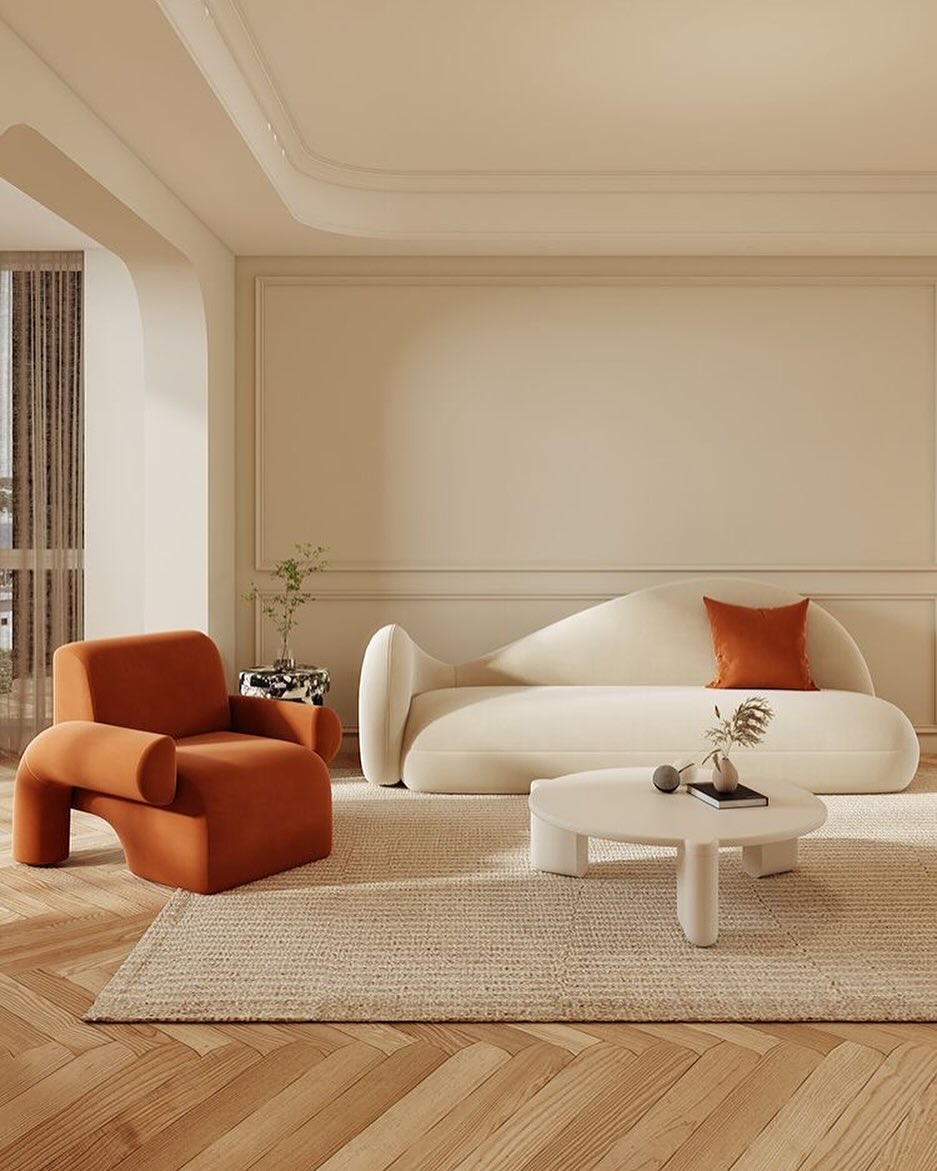 A modern, minimalistic living room with warm tones and sleek furniture