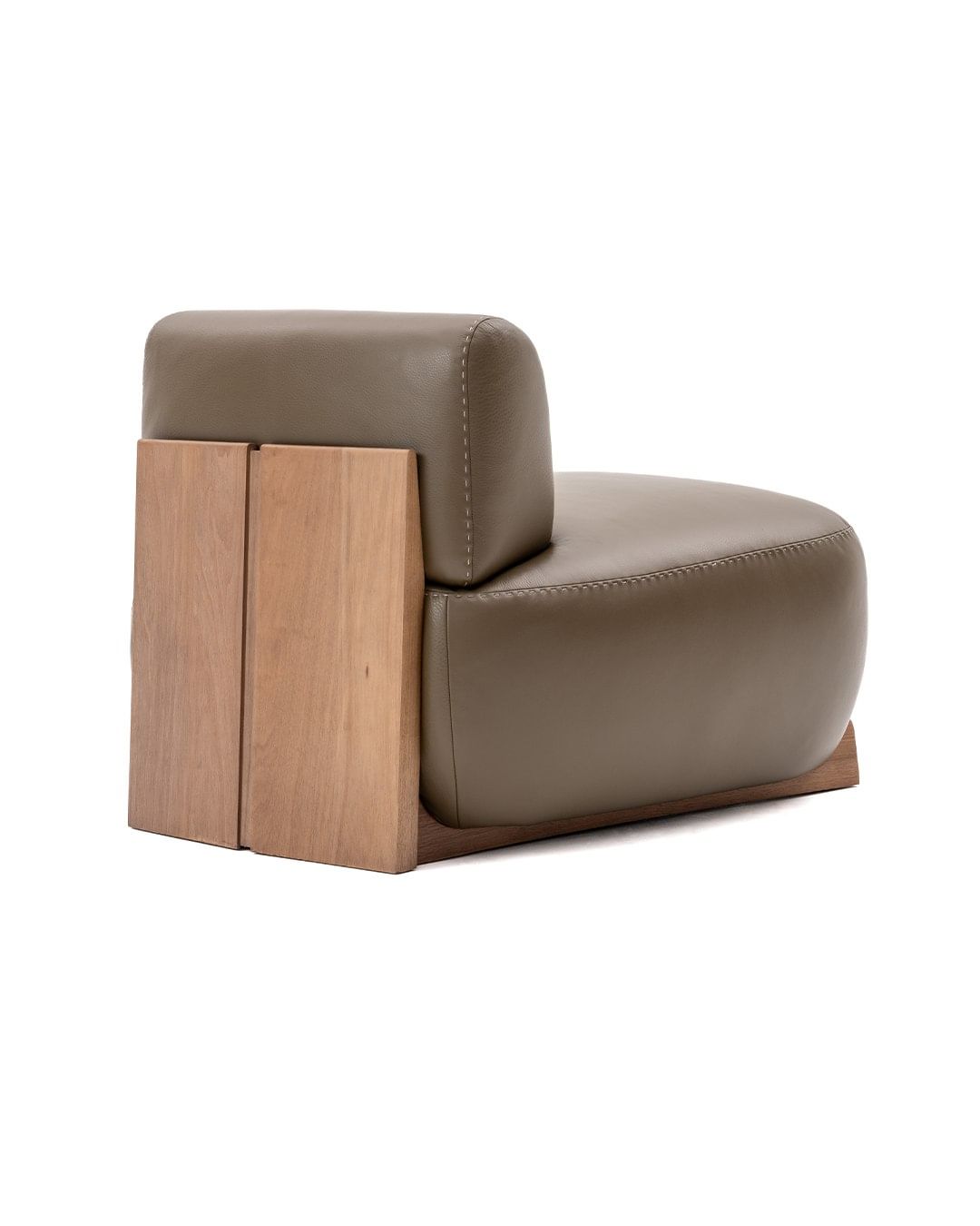 A sophisticated fusion of taupe leather upholstery with warm wood accents makes this chair a modern statement piece