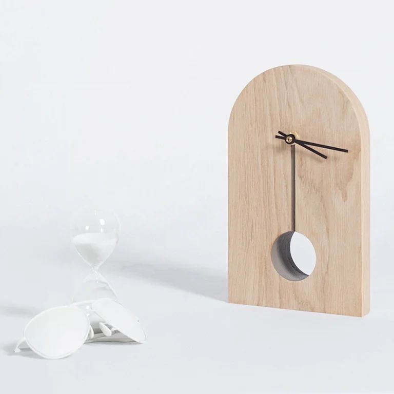 Minimalist Wooden Clock and Hourglass on a Counter