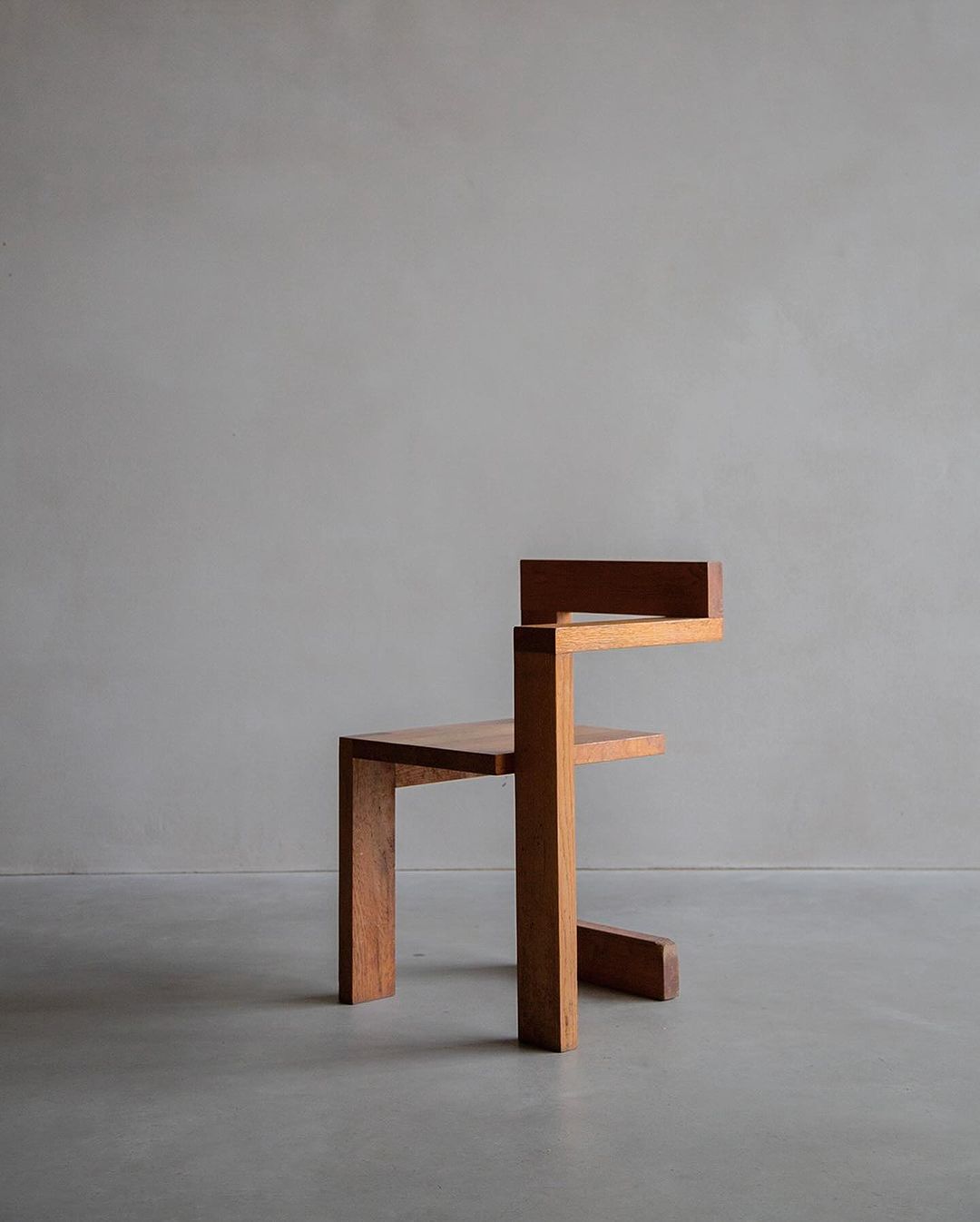 A unique wooden chair design with a modern aesthetic