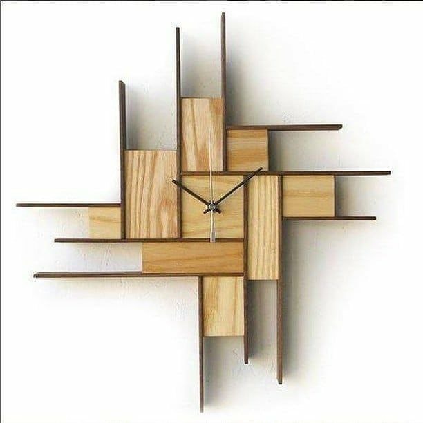 A striking modern wall clock composed of interlocking wooden elements