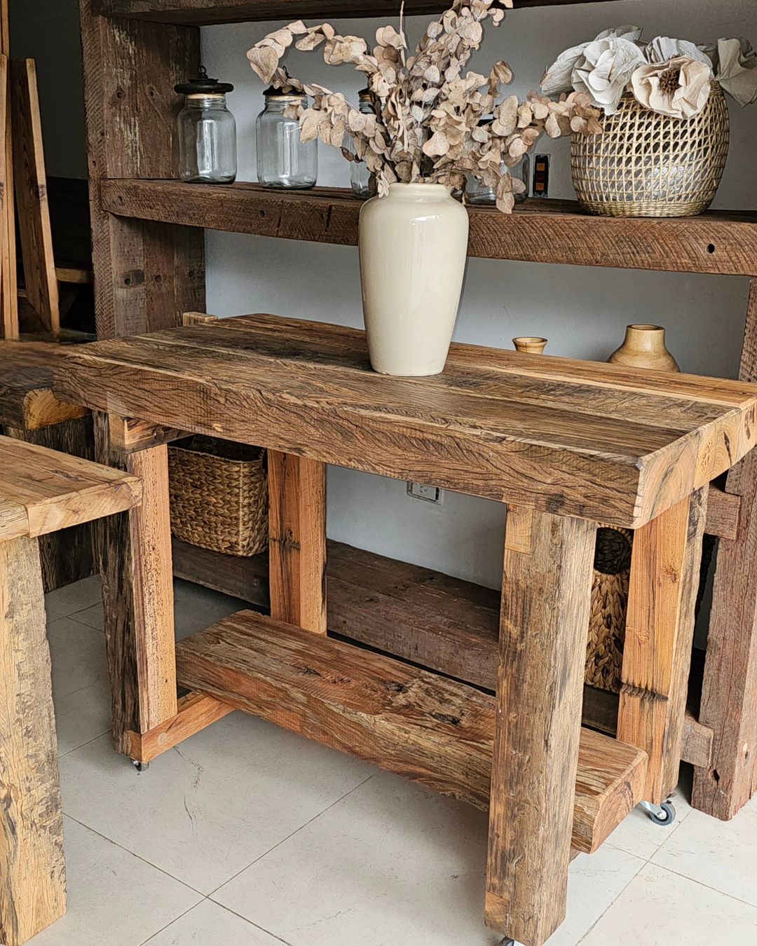 Rustic wooden console with decorative items