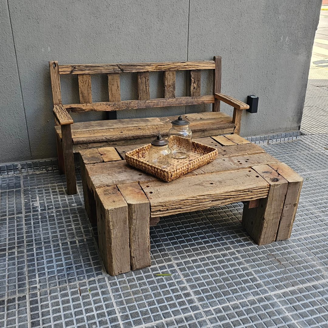 Rustic outdoor wooden bench and table