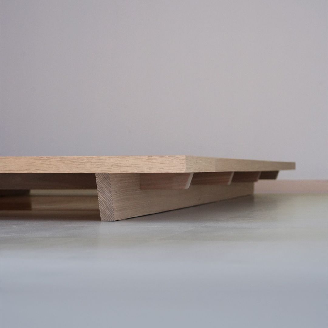 A minimalist wooden platform displaying the beauty of simplicity and craftsmanship