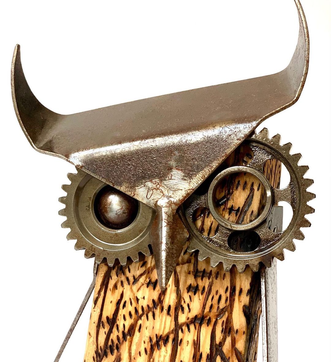 An intriguing steampunk-style owl sculpture