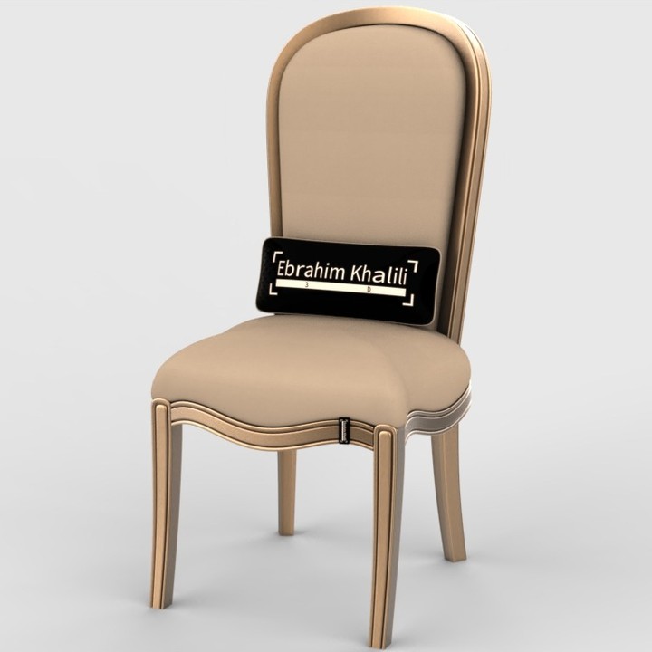 Beige upholstered chair with a name tag displaying 'Ebrahim Khalili'