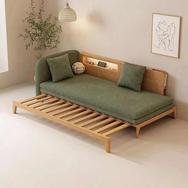 Modern green daybed with integrated shelving and extendable platform