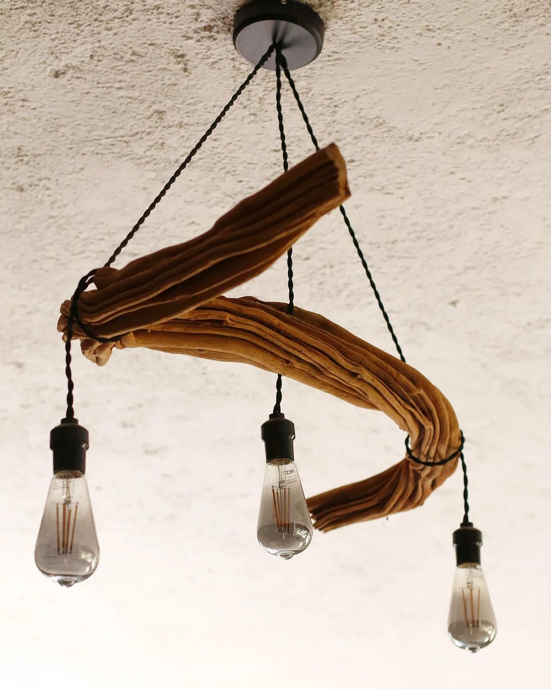 A rustic and innovative light fixture