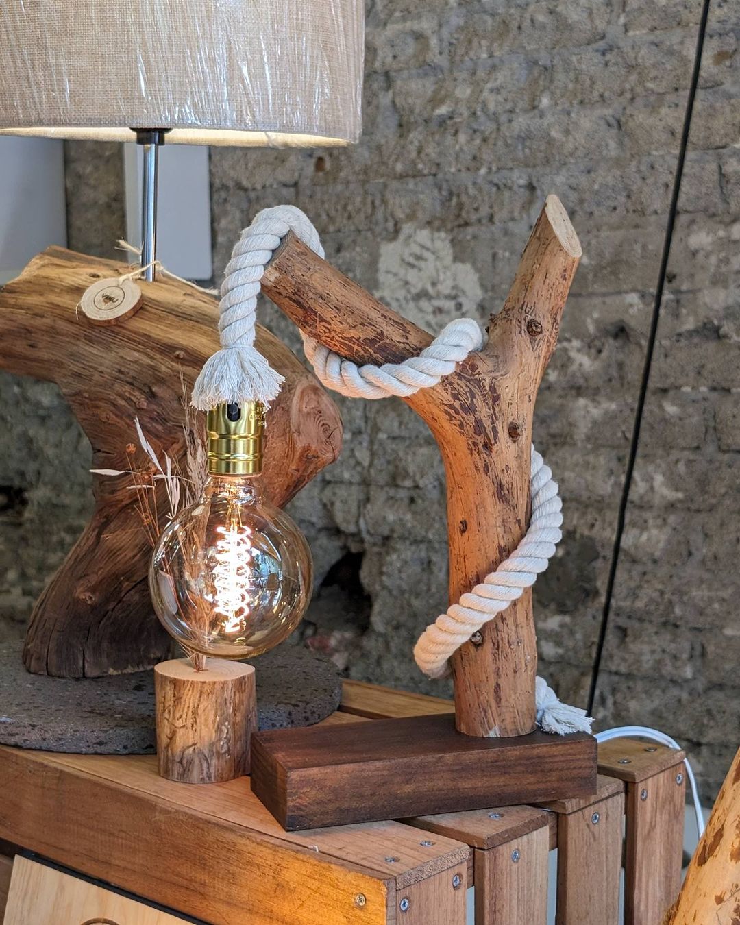 Unique wooden lamp with twisted white rope